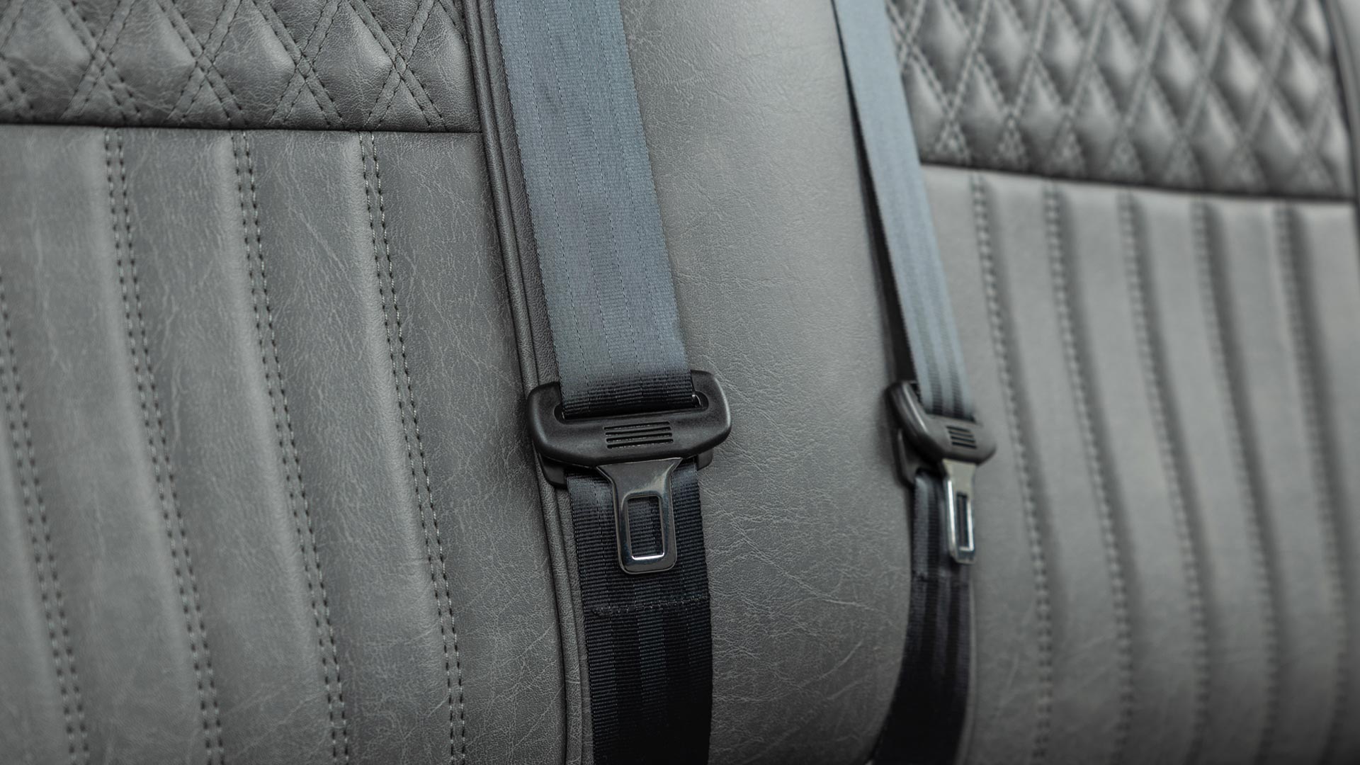 Atlas four-wheel hydraulic disc brakes and safety seatbelts