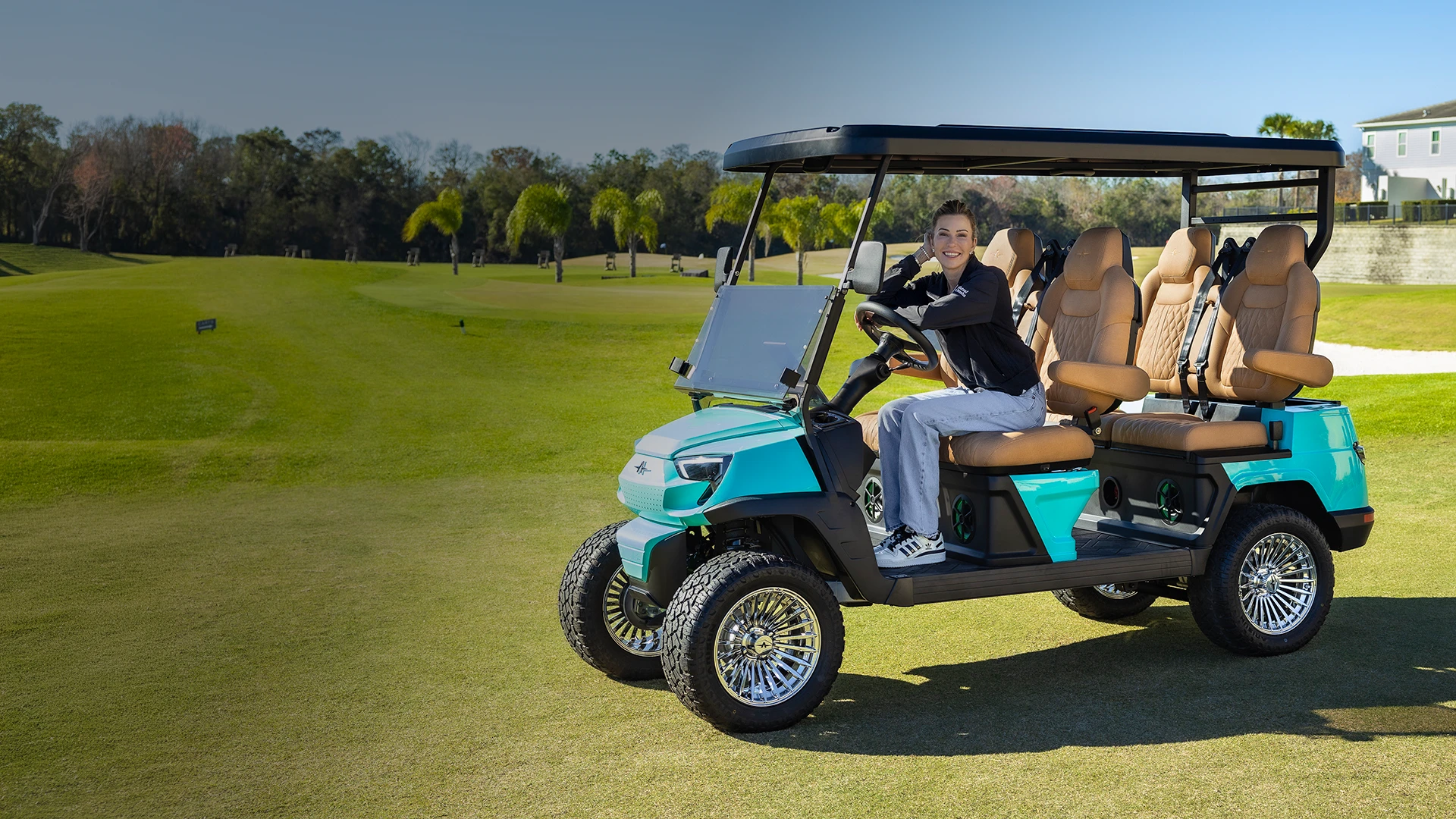 Atlas ONE custom electric golf cart with LPGA professional Paula Creamer